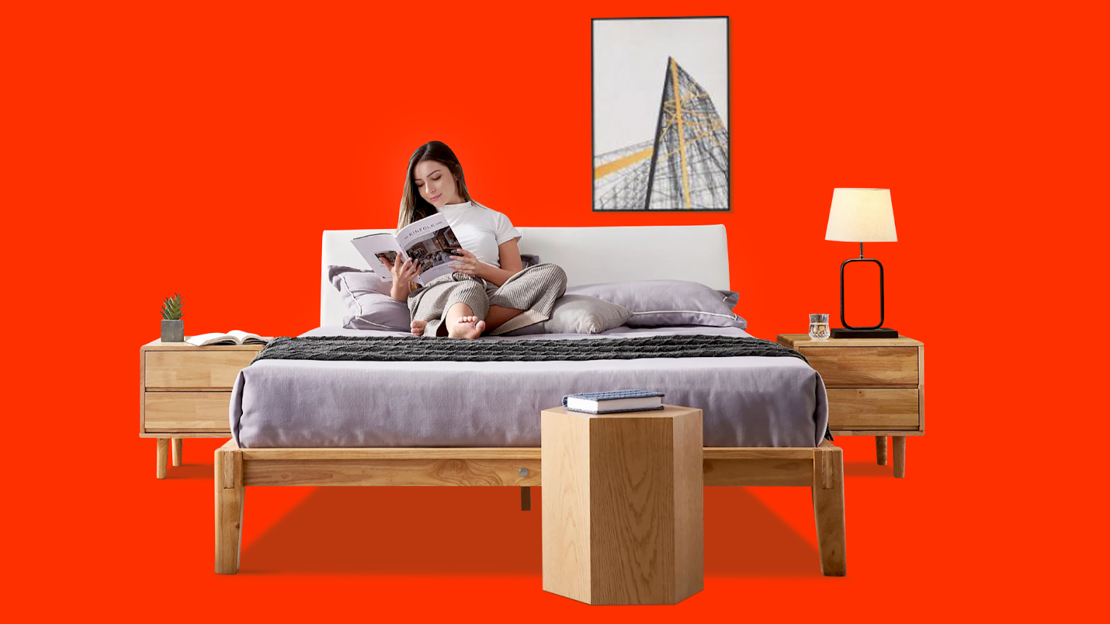 Woman sitting cross-legged on a wooden platform bed, floating nightstands and a minimalist coffee table in front of her as part of Black Friday deals on bedroom furniture.