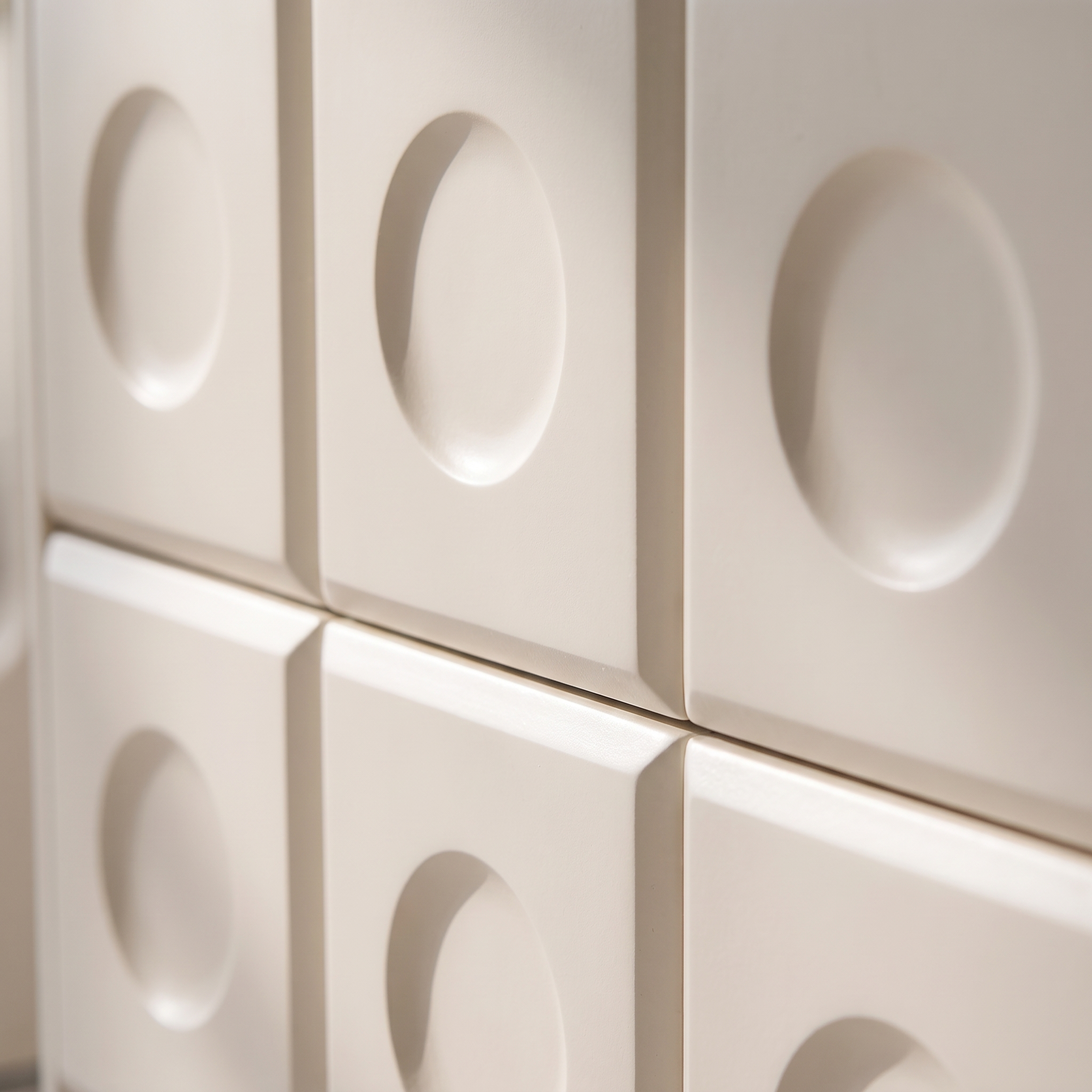 Napili Vanity Set - macro detail of the raised circle motif on the drawer fronts