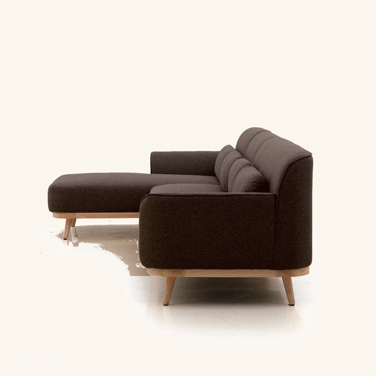 Solid Wood Sectional 135 inch Brown Facing Left rendered v3 side on #FAF6EE